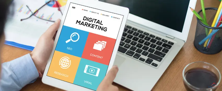 ADAG-A person holding a tablet with digital marketing page