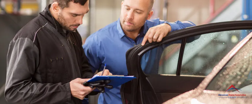 ADAG - An auto repair mechanic talking to a customer.
