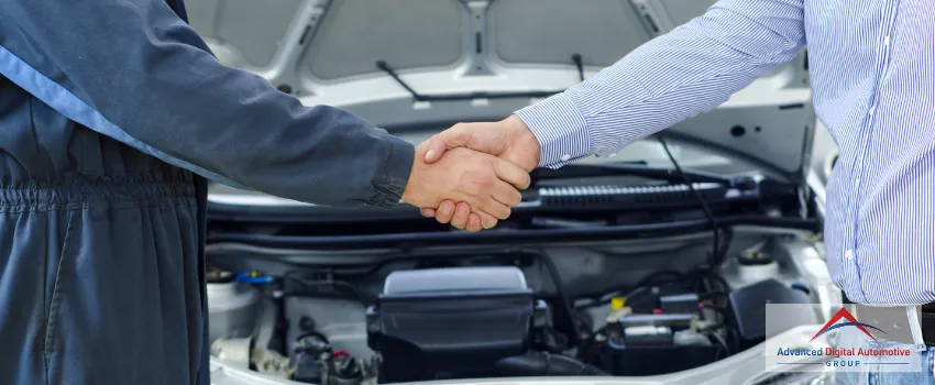 ADAG - Customer shaking hands with mechanic